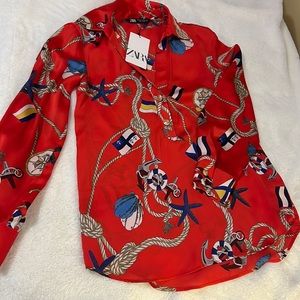 Red “ocean” themed blouse